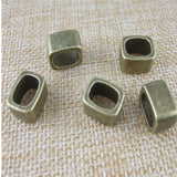50pcs Antique Bronze 10x7mm Licorice Sliders Spacer Beads