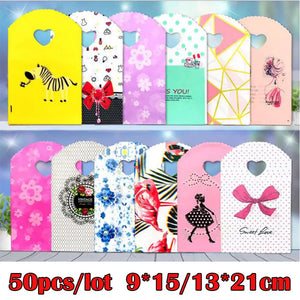 50pcs 13xx21cm Jewelry Bag Pattern Plastic with Handle Candy Cookie Favor Bag