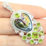 Fire Rainbow Titanium Goddess Face Green Peridot Eye-Catching Silver Pendant