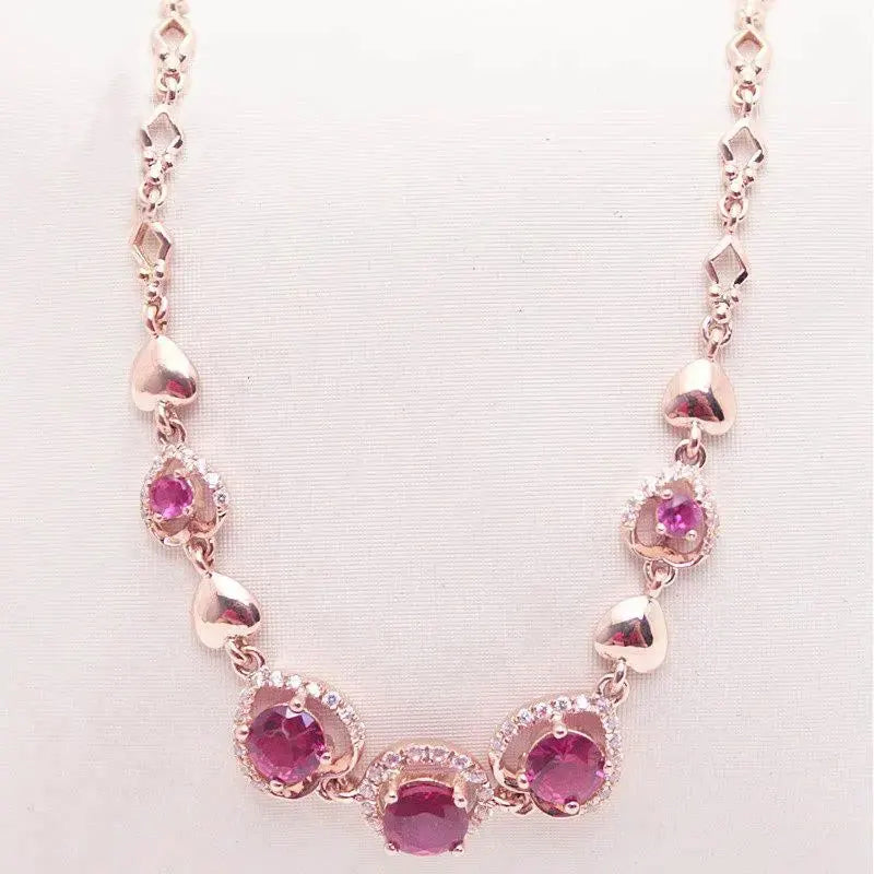 14K Rose Gold Ruby Bracelet with Love Charm