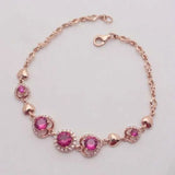 14K Rose Gold Ruby Bracelet with Love Charm