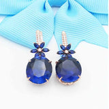 14K Rose Gold Oval Sapphire Flower Earrings