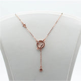 Geometric Tassel Necklace in 14K Rose Gold Plating