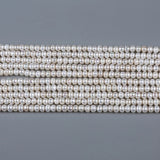 6-7mm Natural Fresh Water Button Pearl with Centre Hole