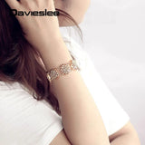 585 Rose Bangle Bracelet Cut Out Carved Flowers Oval Shaped Jewelry