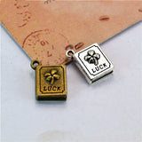 80Pcs Lucky Clover Book Charms for Jewelry Making Can Mix