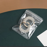 Grid Transparent Jewelry Storage Book with 50 Thicken PVC Zipper Closure Bags