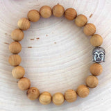8mm Sandalwood Bead Bracelet with Silver Buddha Head
