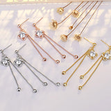 Sterling Silver Four-Leaf Clover Tassel Earrings