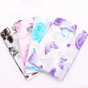 100Pcs 9X15cm Plastic Gift Bags Stars Heart Butterfly Jewelry Pouches