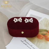 Hand-woven Bow Freshwater Pearl Earrings