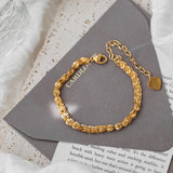 18K Scalloped Bracelet with Phoenix Tail Design