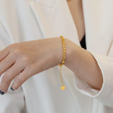 18K Scalloped Bracelet with Phoenix Tail Design