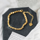 18K Scalloped Bracelet with Phoenix Tail Design