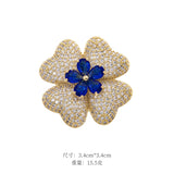 Blue/Green Glass Flower Brooch Pin with Zircon Detailing