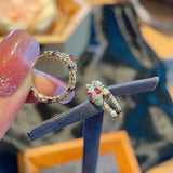 Red Zircon Snake-ear Buckle Earrings with Copper Inlay