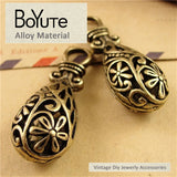 Lot of 10 Antique Bronze Flower Pattern Pendants