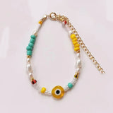 Handmade Bohemian Beads Bracelet with Yellow Eye Embellishment