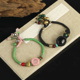 Boho Rose Quartz Wrap Bracelet with Copper Bell Dangle