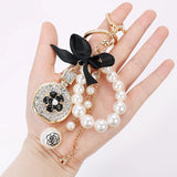 Bow-Knot Pearl Perfume Crystal Bottle Keychain Car Key Ring Bag Charm