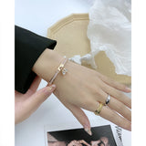 Stainless Steel Bangle Bracelet with Artificial Gem Inlay