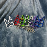 Justice Cat Brass Knuckles Key Ring