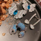 Ruo Xing River Crystal Butterfly Brooch & CZ Crab Ring Set