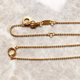 Golden Round Charm Necklace Carrier