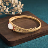 Vintage Hollow Pattern Gold-Plated Jade Bracelet for Women