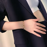 Stainless Steel Rose Roman Numeral Charm Bracelet