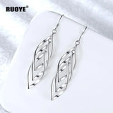 Silver Rose Twist Earrings for Parties