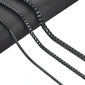 Stainless Steel Plated Necklace Box Chain On Checkered Surface