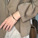 Classic Titanium Steel Roman Numerals Bangle For Women Hollow Number