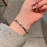 Classic Hollow Roman Numeral Steel Bracelet for Women