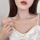 Crystal Tassel Necklace with Love Pendant