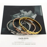Women's Double D Clover Bracelet Titanium Steel Spring Open Bracelet