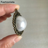 Antique Metal Base Setting With Round Pearls