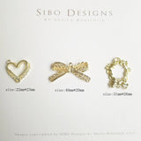 Metal Geometric Butterfly Knot Peach Heart Earrings