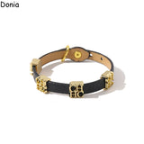 Donia Jewelry 316L Stainless Steel Letter Bracelet Single Loop Leather Rope
