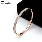 Donia Half Circle 4-Row Zircon Dark Buckle Bracelet
