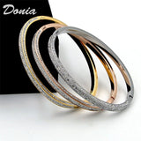 Donia Half Circle 4-Row Zircon Dark Buckle Bracelet
