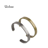 Antique Silver Stainless Steel Leopard Dot Bangle