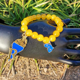 Elastic SGR Yellow Glass Beads Poodle Charm Bracelet Set