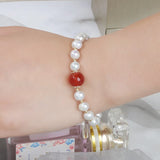 Freshwater Pearl Bracelet with Red Agate Charm