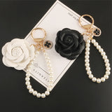 Elegant PU Leather Rose Camellia Flowers Pearls Chain Keychain Women