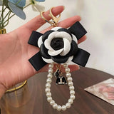 Elegant PU Leather Rose Camellia Flowers Pearls Chain Keychain Women