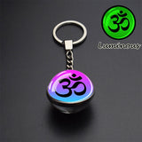Esspoc 35mm Glass Ball Keychain Glowing Om Flower