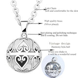 Copper Harmony Ball Pendant Necklace with Carved Flower Star Heart Design