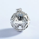 Copper Harmony Ball Pendant Necklace with Carved Flower Star Heart Design