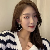Exaggerated Silver Love Heart Clip Earrings